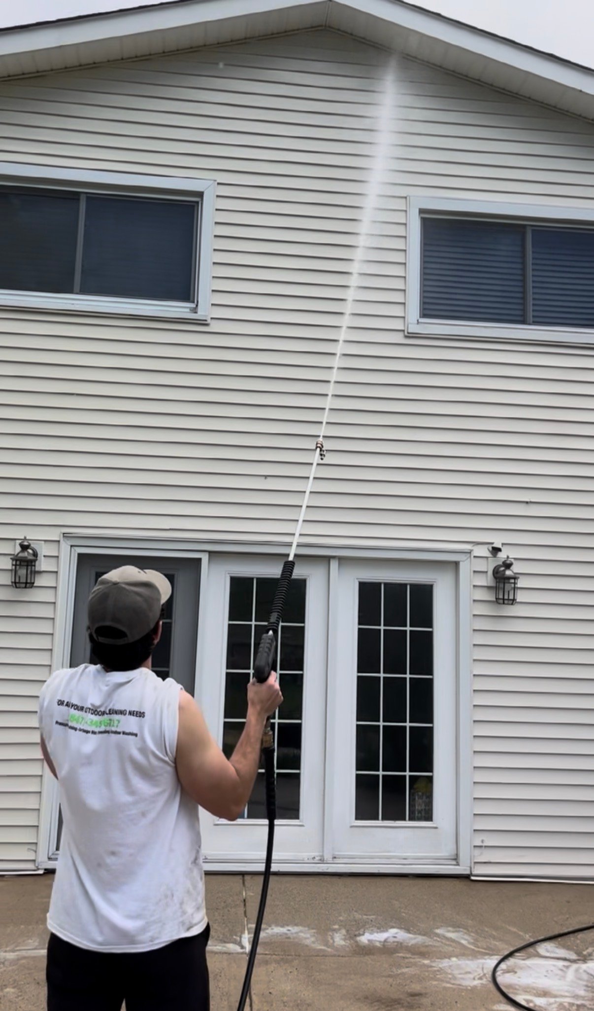 Pressure washing a driveway
